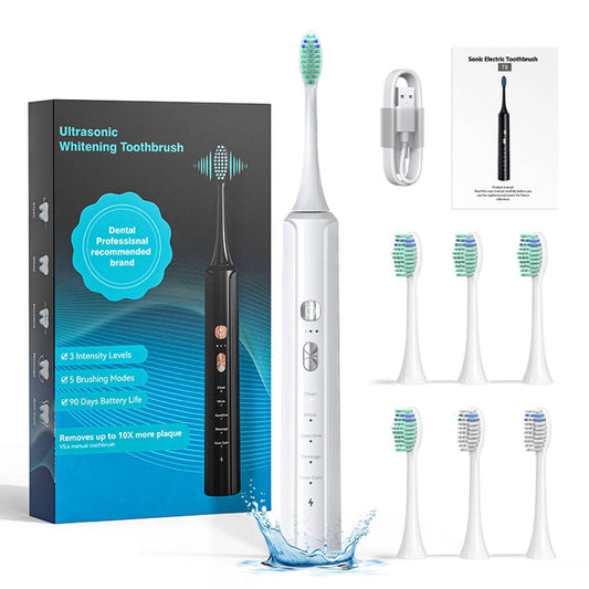 Powerful Sonic Electric Toothbrush with multiple brush heads, USB charging cable, and black and white sleek design for advanced oral care.