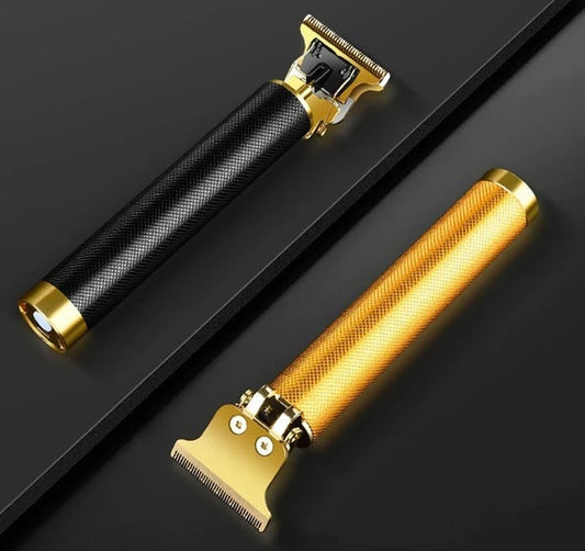 professional hair clippers trimmer with black and gold textured handles and titanium T blades